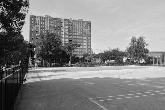 The concrete expanse of the old yard