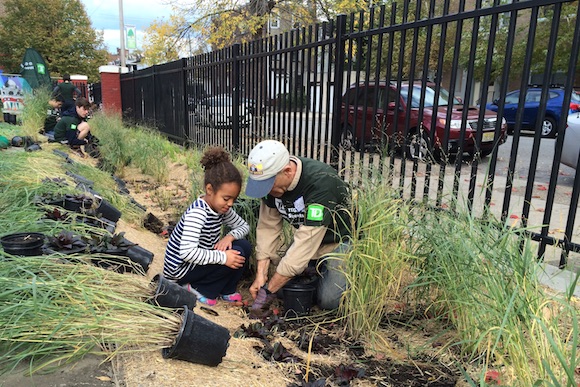 Volunteers planting at Lea Elementary