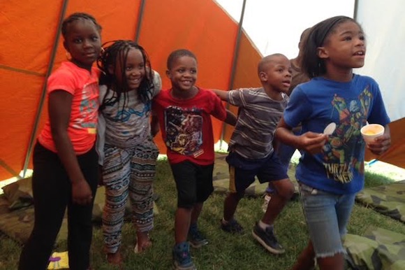 Local kids enjoy the teepee