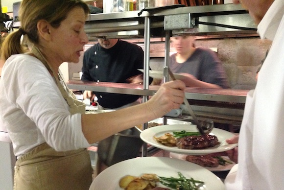 Deb Adams in the kitchen at Gateway Lodge