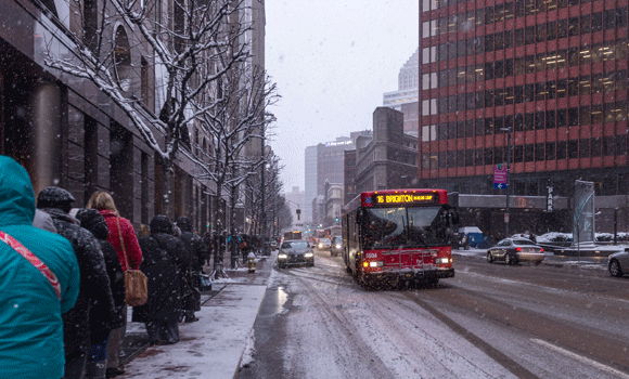 Commuters wait for their PAT bus Downtown